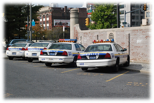 Philadelphia Police Departments cars line the street
