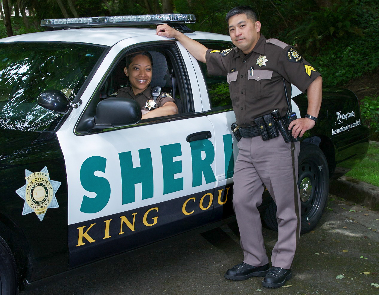 King County Sheriff's car and deputies