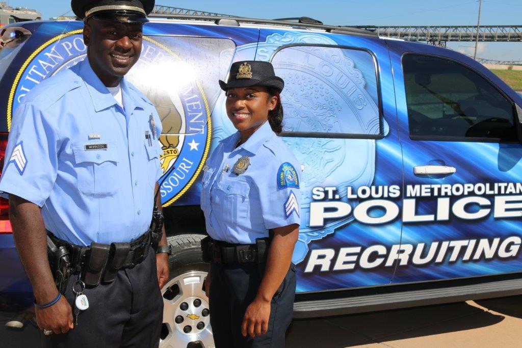 St. Louis Metropolitan Police Department officers and recruiting van