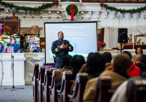 Kansas City Police leader speaks before community members at call-in meeting