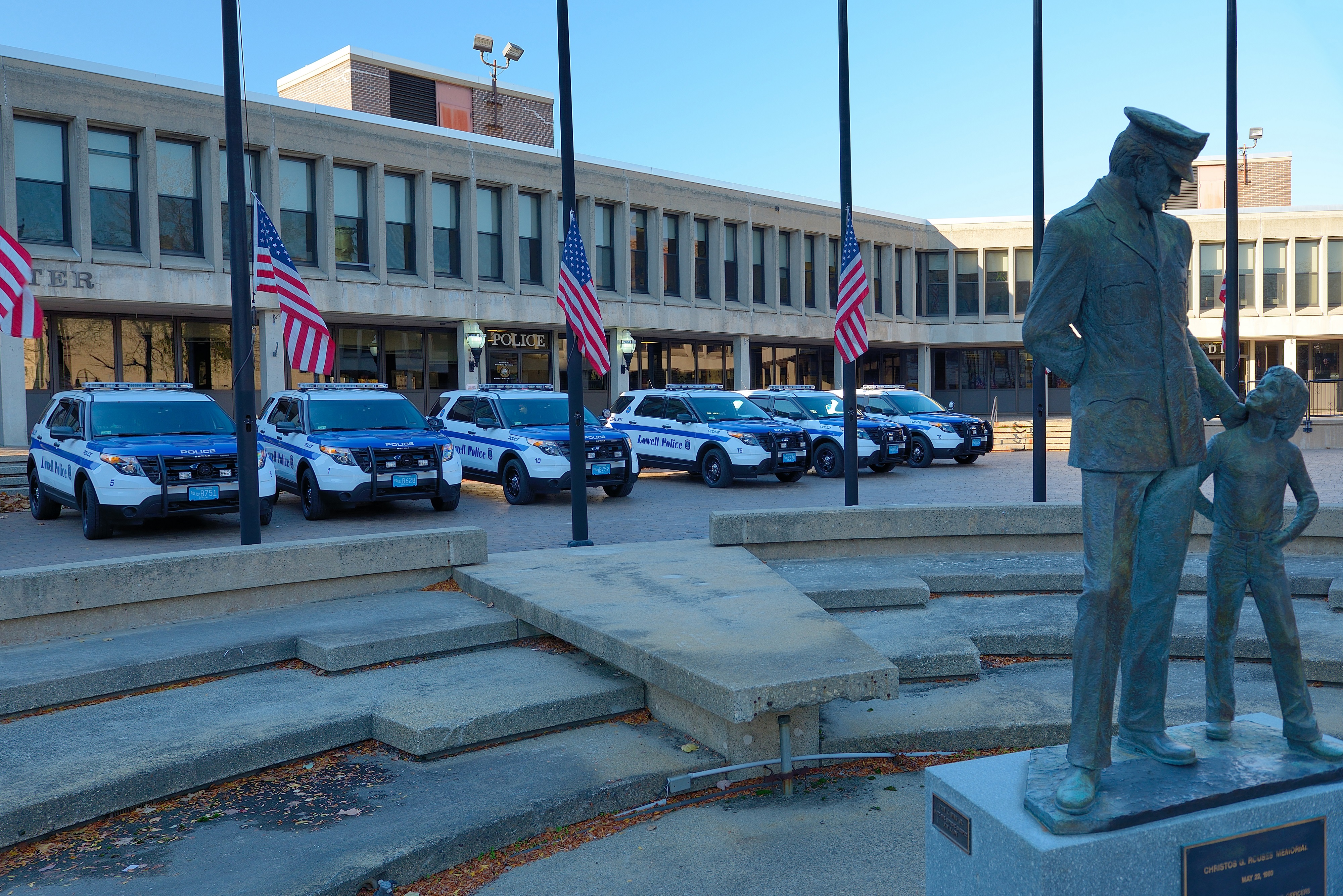 Lowell Police Department building and cars
