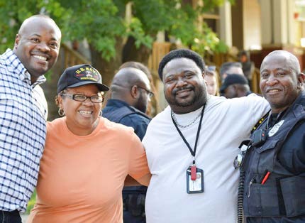 Milwaukee Police officer and community members