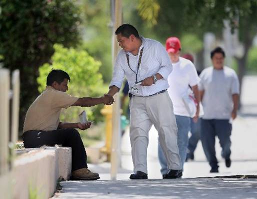 Outreach Coordinator meets with community member