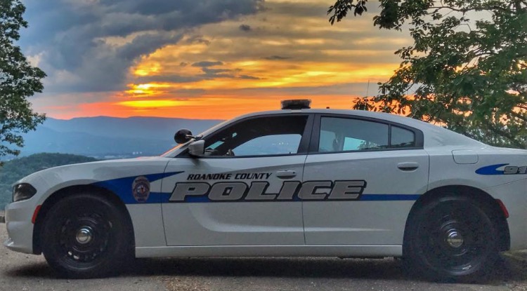 Roanoke County Police Department car against skyline