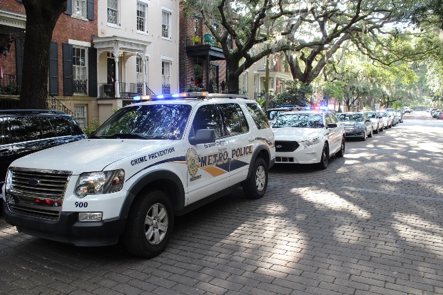 Savannah Police cars lining neighborhood street